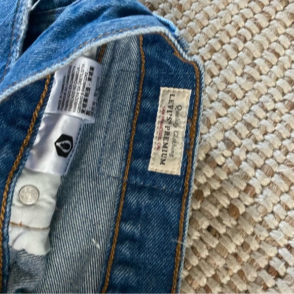 Levi's Blue Distressed Jean Shorts with Frayed Hem - Picture 2 of 5